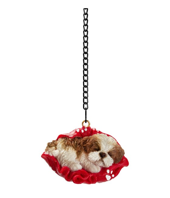 Σιχ Τσου (Shih Tzu) κοιμάται σε κουβέρτα, κρεμαστό στολίδι